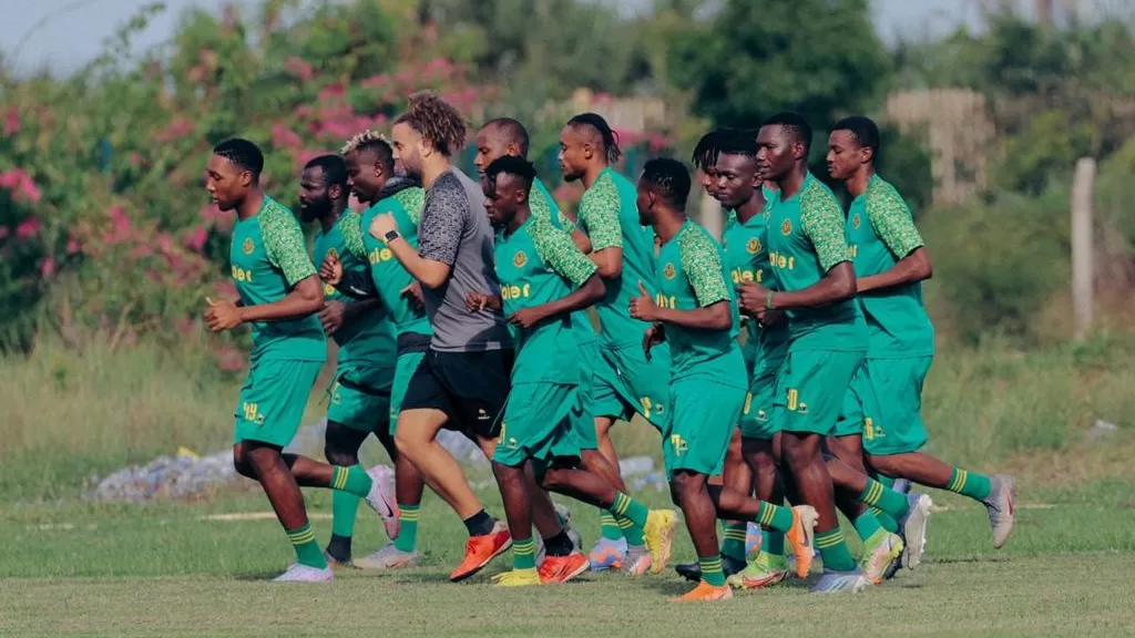 Young Africans players with Helmi
