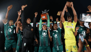 AmaZulu FC players lifting Prince Mangosuthu Legacy Cup