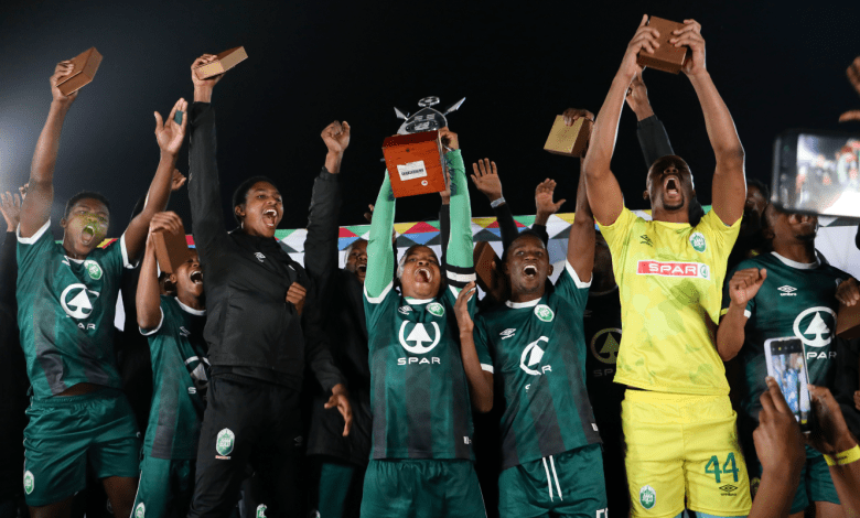 AmaZulu FC players lifting Prince Mangosuthu Legacy Cup