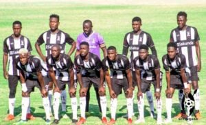 Highlanders FC players pose for photo before a Castle Lager Premier Soccer League match