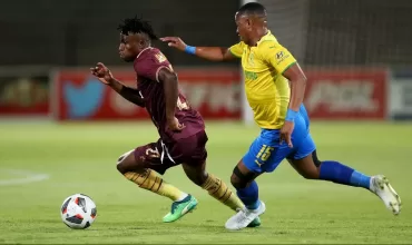 Stellenbosch FC attacker Ibraheem Jabaar tussling for the ball with Andile Jali