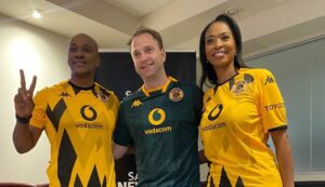 Jessica Motaung with Kaizer Motaung Jr and Ricky Joseph pose in new Kaizer Chiefs Kappa kits