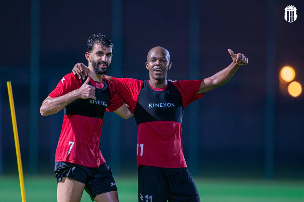 Knowledge Musona with a teammate during training at Al Riyadh. Photo by Al Riyadh