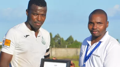 Mxolisi Mkhonto receiving Player of the Week award