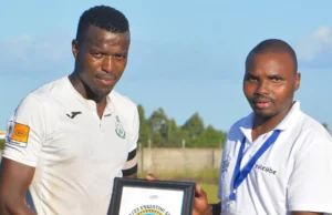 Mxolisi Mkhonto receiving Player of the Week award