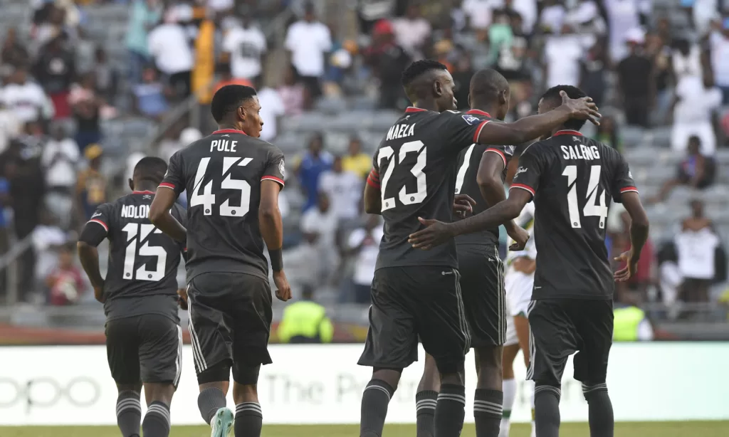 Vincent Pule of Orlando Pirates celebrates a goal with teammates