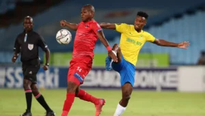 Siphesihle Mkhize of Chippa United shields Themba Zwane of Mamelodi Sundowns