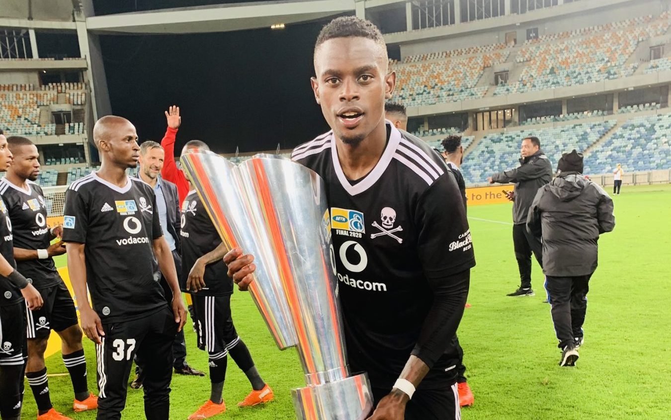 Innocent Maela with MTN 8 trophy