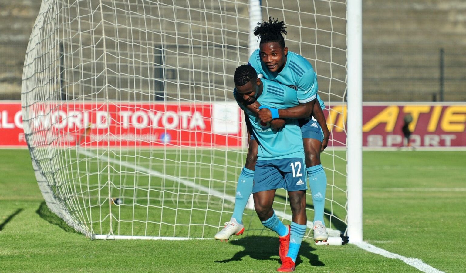 Collins Makgaka and Kwame Peprah celebrating during their days at Orlando Pirates