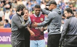 Lyle Foster and Vincent Kompany during a game