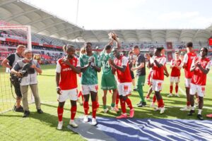 French Ligue 1 squad celebrate their win with a former Orlando Pirates star in the picture