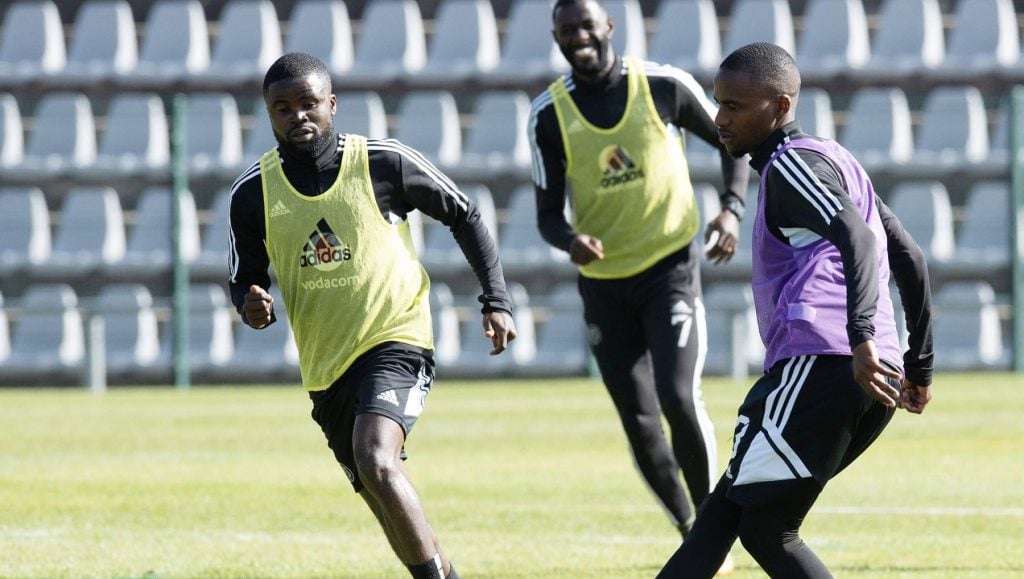 Thembinkosi Lorch and Lesedi Kapinga at training