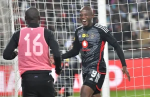 Zakhele Lepasa celebrating a goal with his Orlando Pirates teammate