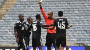 Orlando Pirates players complaining to Luxolo badi