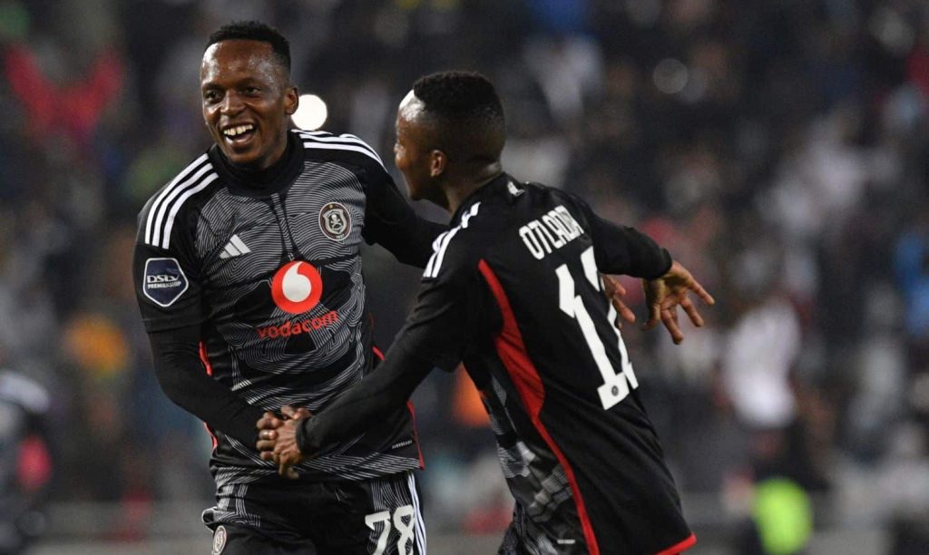 Patrick Maswanganyi celebrates a goals with Katlego Otladisa