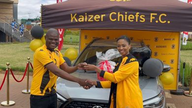 KAIZER CHIEFS marketing director Jessica Motaung handing over the car to the lucky winner Makhubela