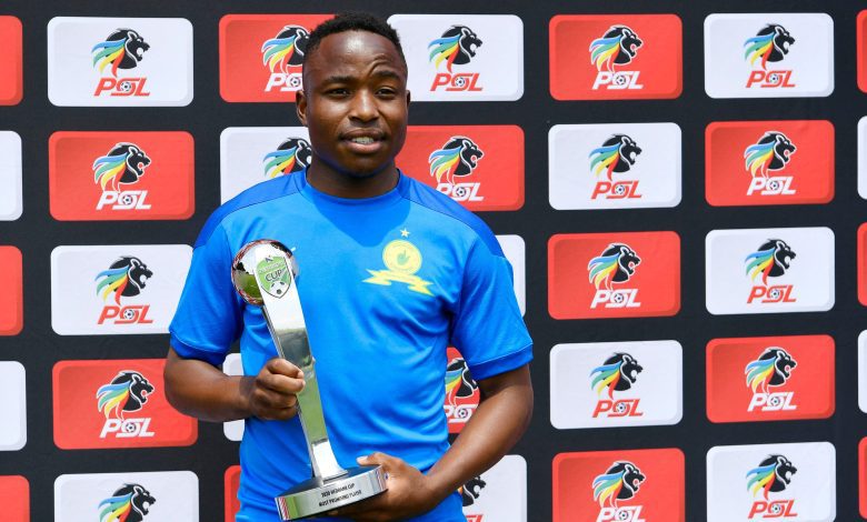 Former Mamelodi Sundowns midfielder Keletso Makgalwa showing off his Nedbank Cup award.