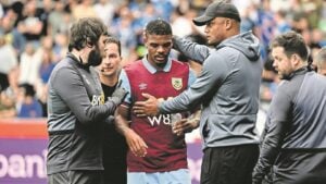 Burnley FC boss Vincent Kompany and striker Lyle Foster.
