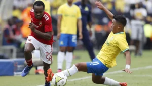 Percy Tau playing against Mamelodi Sundowns