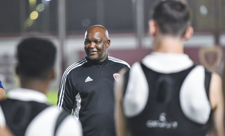 Pitso Mosimane addressing his Al Wahda players