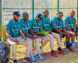 Thabo Senong and the Singida technical team.jpeg
