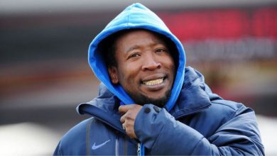 Godfrey Sapula attending a soccer match