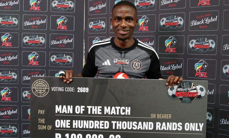 Orlando Pirates winger Thembinkosi Lorch showing off his R100K prize money.
