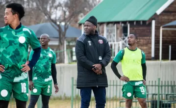 Steve Komphela during a training session with his players