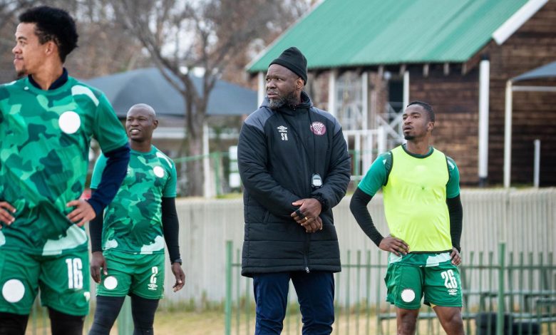 Steve Komphela during a training session with his players