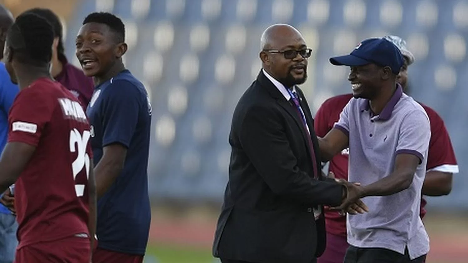 David Mogashoa of Moroka Swallows with the club's players after a game