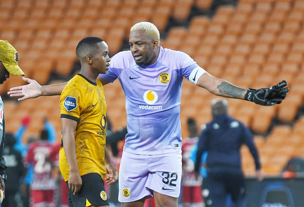 Itumeleng Khune of Kaizer Chiefs talking to a player during a game