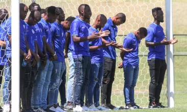 Pretoria Callies players doing a pitch inspection before a game