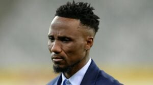 Former Mamelodi Sundowns midfielder Teko Modise on the touchline during a match