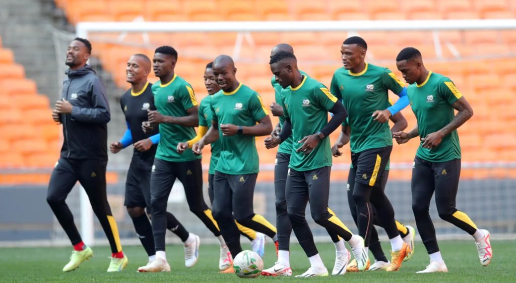 Bafana Bafana players warming up at FNB Stadium