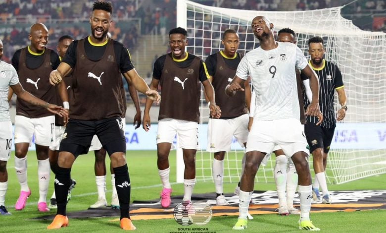 Bafana Bafana teammates celebrate with scorer Evidence Makgopa at AFCON