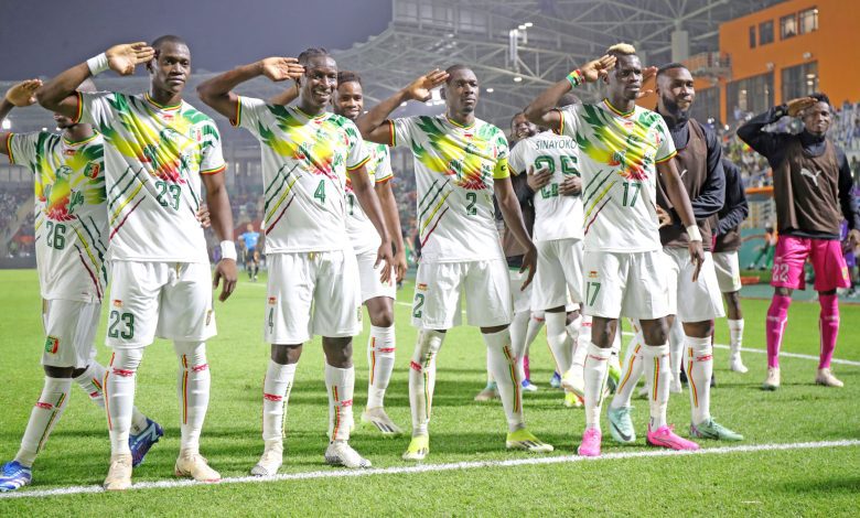 Mali players celebrate a goal at 2023 AFCON