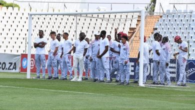 Moroka Swallows players during pitch inspection before a DStv Premiership match