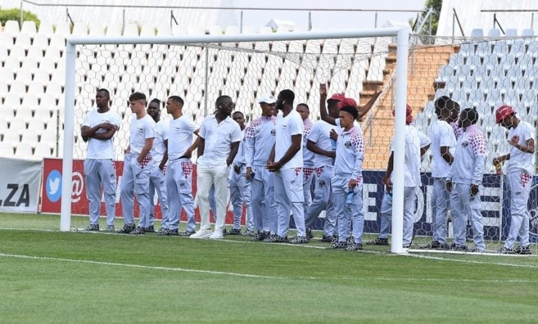 Moroka Swallows players during pitch inspection before a DStv Premiership match