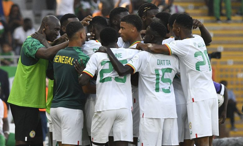 Senegal players in celebratory mood.