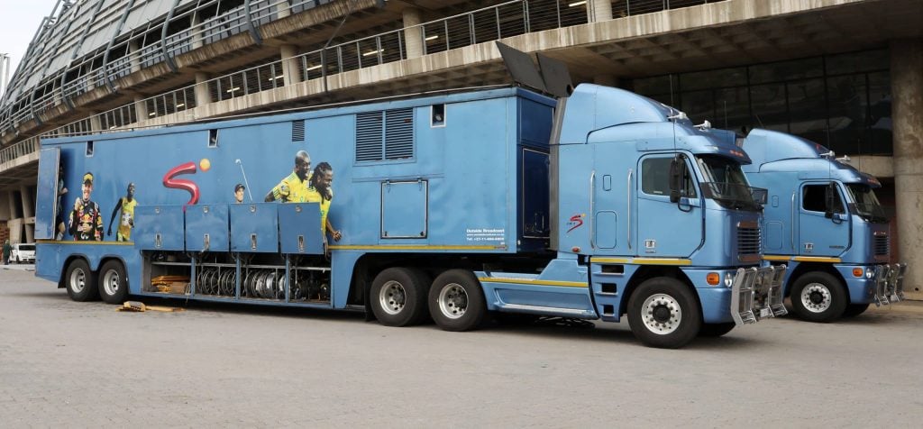 SuperSport TV broadcast trucks in a stadium. No AFCON broadcast