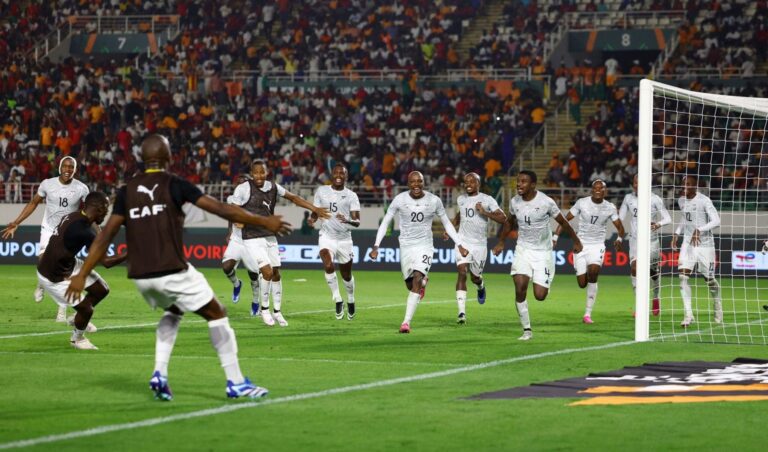 Bafana Bafana players celebrating a goal with Veli Mothwa part of it