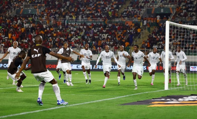 Bafana Bafana players celebrating a goal with Veli Mothwa part of it