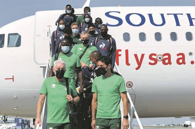 Bafana Bafana players jetting off a plane