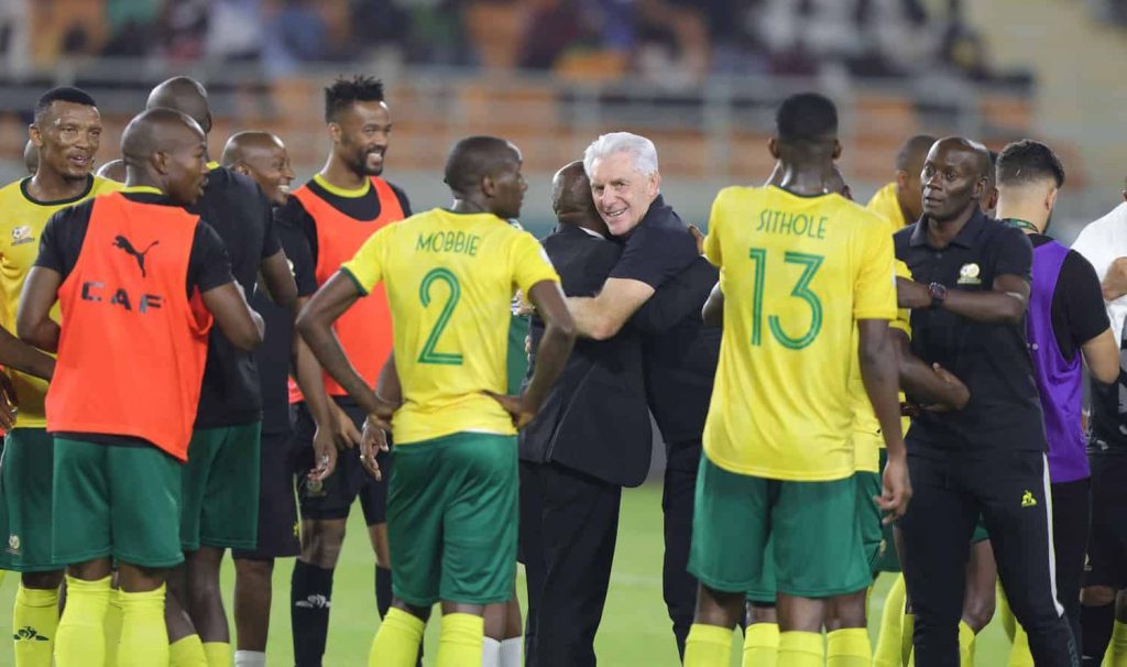 Hugo Broos celebrates on the pitch after Bafana Bafana match at 2023 AFCON