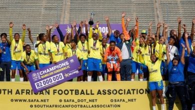 Mamelodi Sundowns Ladies lifting the Hollywoodbets Super League trophy.