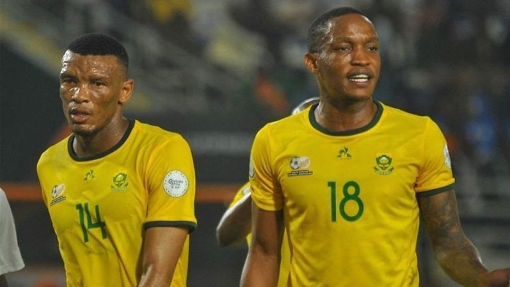 Mothobi Mvala and Grant Kekana in action for Bafana Bafana at the 2023 AFCON.