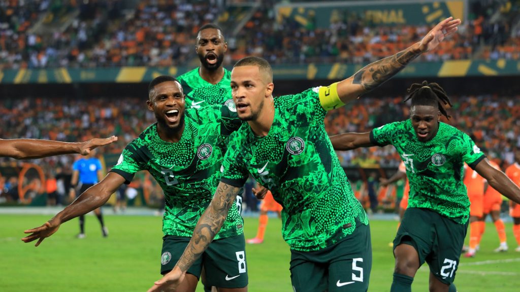 Nigeria capital William Troost-Ekong celebrating with teammates in AFCON final