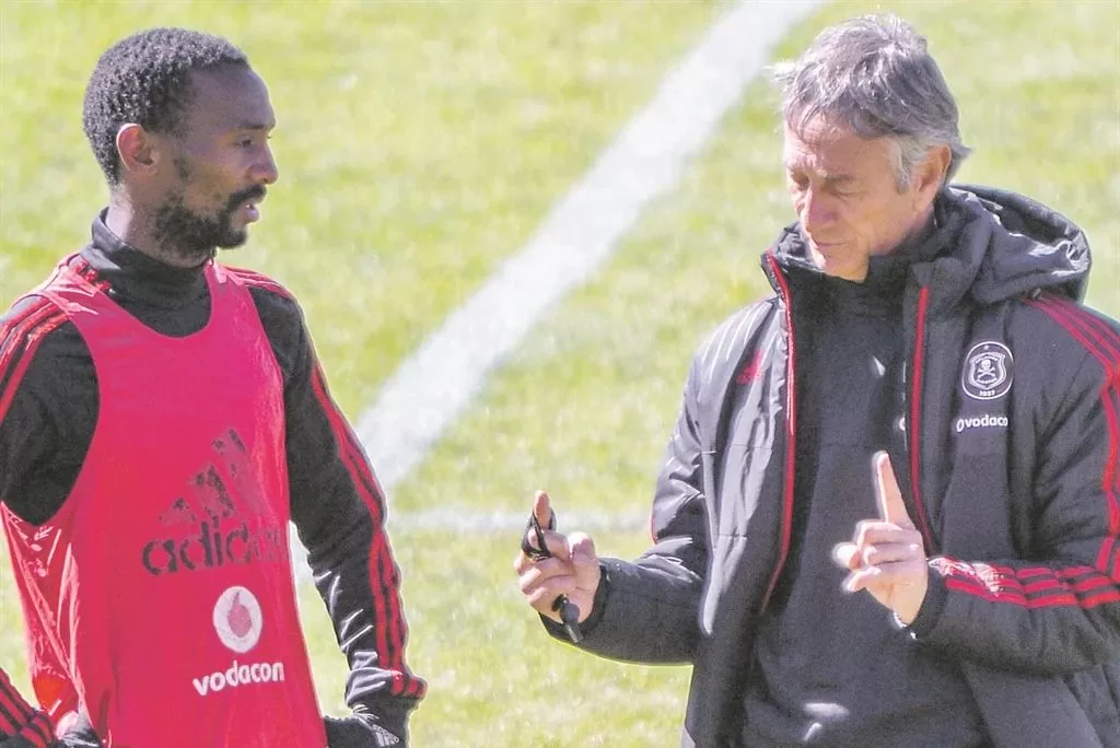 Thabo Rakhale and Muhsin Ertugral during their time at Orlando Pirates talking