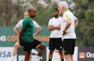 Percy Tau and Hugo Broos at Bafana