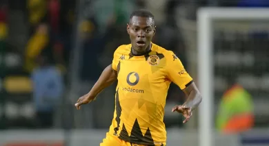 Zitha Kwinika running in action for Kaizer Chiefs